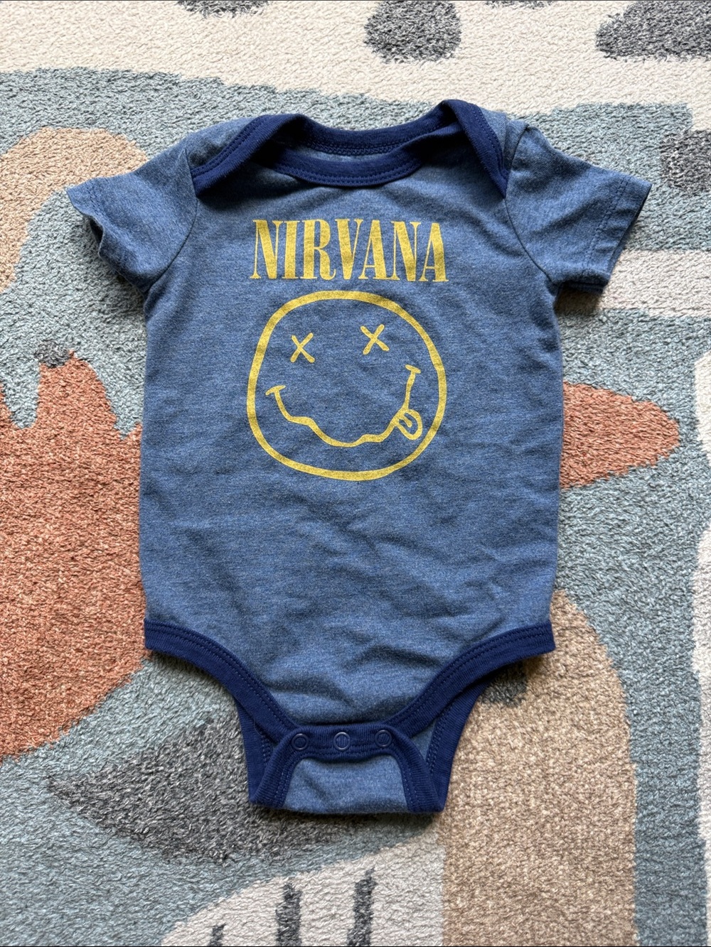 NIRVANA Blue Infant Bodysuit with Yellow Smiley Logo